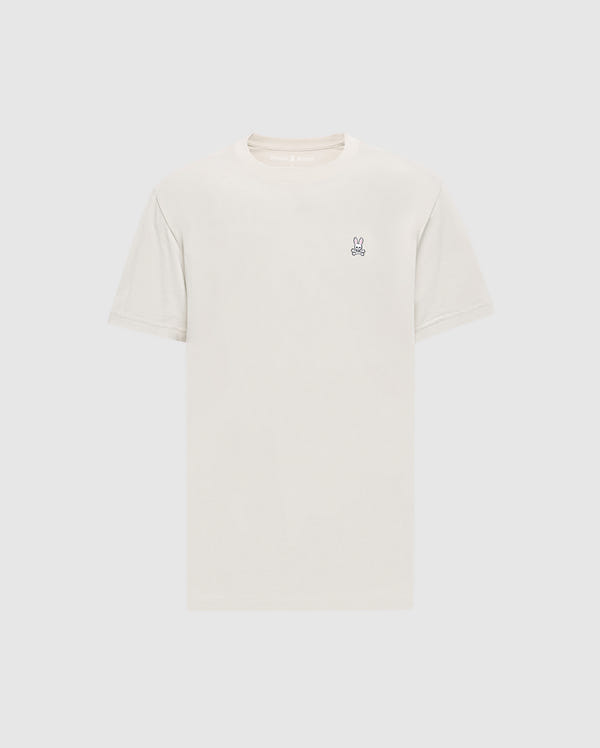 The Psycho Bunny Men's Classic Crew Neck Tee (B6U014B200) in light beige is a premium Pima cotton shirt with short sleeves and an embroidered bunny logo on the upper left chest. Set against a simple white background, it embodies timeless appeal.