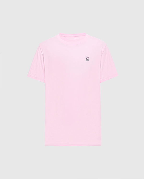 The light pink Men's Classic Crew Neck Tee (B6U014CRPC) by Psycho Bunny is crafted from soft pima cotton with a small embroidered peace sign hand symbol on the top left chest against a plain gray background, making it versatile and stylish for any casual occasion.