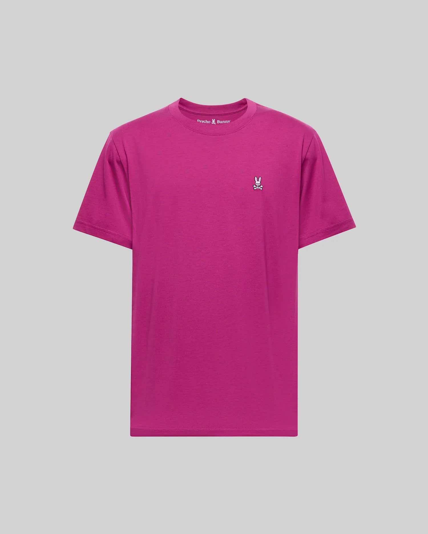 The Psycho Bunny MENS CLASSIC CREW NECK TEE (B6U014F200) is a premium magenta Pima cotton shirt with a white embroidered bunny logo on the left chest, shown against a light gray background.