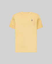 The Psycho Bunny MENS CLASSIC CREW NECK TEE (B6U014F200) is a light yellow Pima cotton jersey shirt with a small embroidered bunny logo on the left chest, shown on a flat gray background.