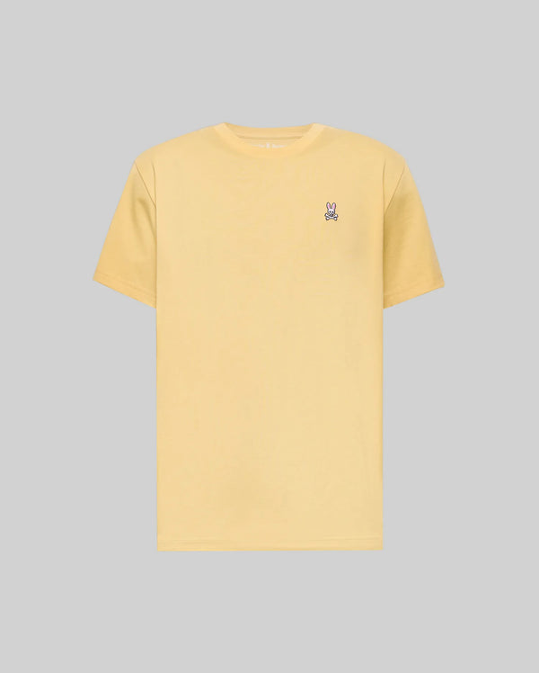 The Psycho Bunny MENS CLASSIC CREW NECK TEE (B6U014F200) is a light yellow Pima cotton jersey shirt with a small embroidered bunny logo on the left chest, shown on a flat gray background.
