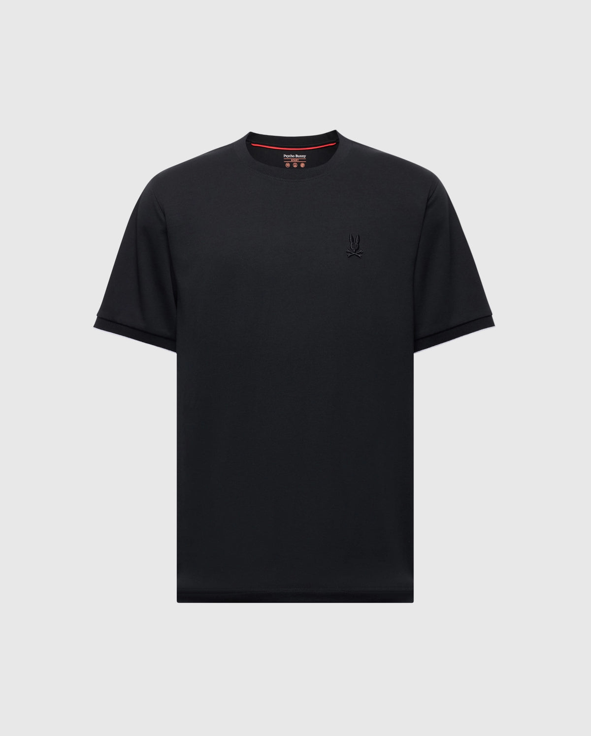 The Psycho Bunny MENS BRYCE PERFORMANCE TEE - B6U490F200, a black T-shirt, features a small emblem on the left chest. Crafted in Peru from Modal-Pima Cotton, it includes a red interior collar detail and simple cut sleeves and hem.