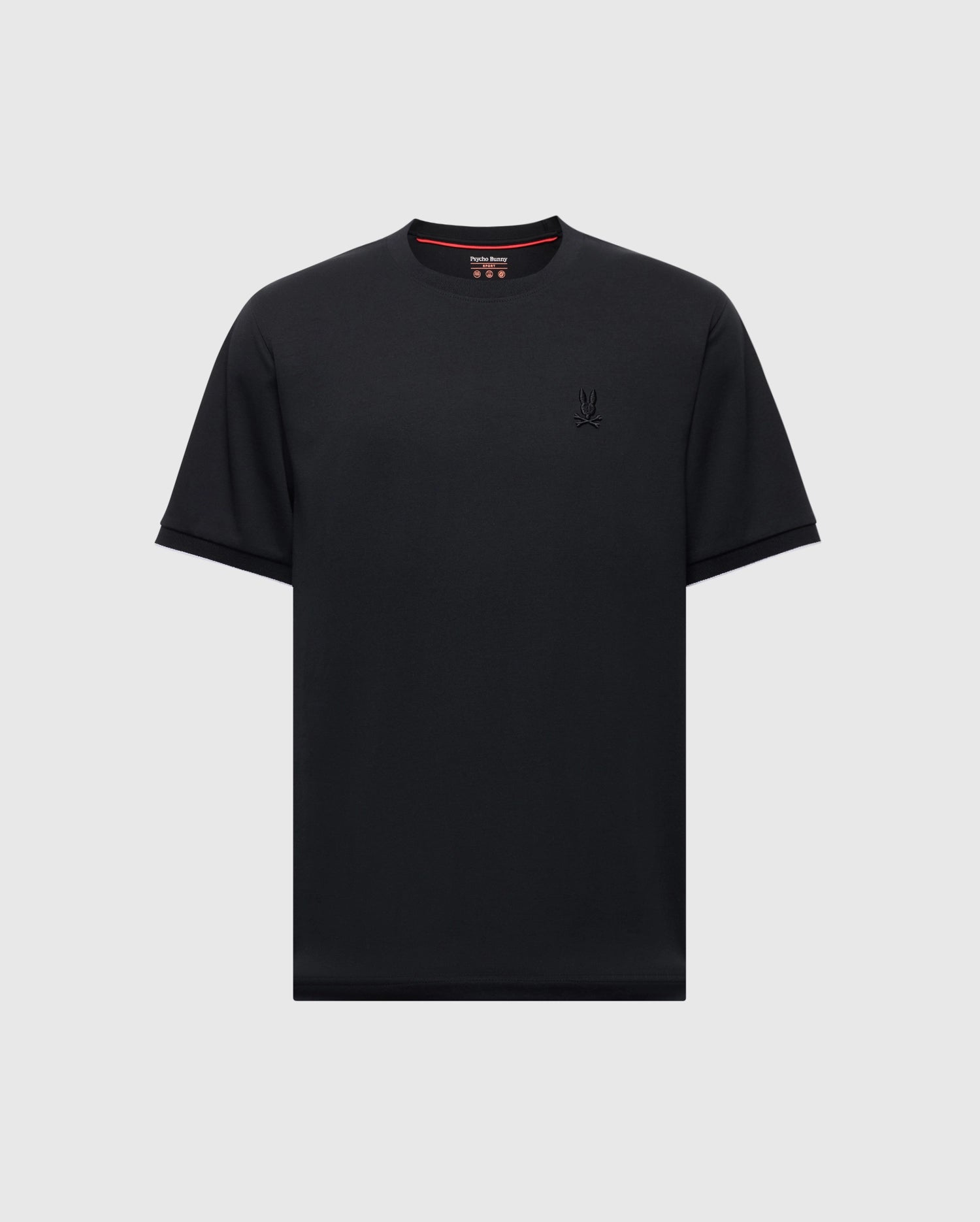 The Psycho Bunny MENS BRYCE PERFORMANCE TEE - B6U490F200, a black T-shirt, features a small emblem on the left chest. Crafted in Peru from Modal-Pima Cotton, it includes a red interior collar detail and simple cut sleeves and hem.