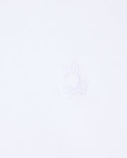 The MENS DUKE OVERSIZED TEE - B6U742D200 by Psycho Bunny is crafted from heavyweight Pima cotton and features a subtle, minimalist embroidered logo in the center, showcasing a bunny head above crossed bones. The matching white embroidery seamlessly blends with the fabric, providing a relaxed fit.