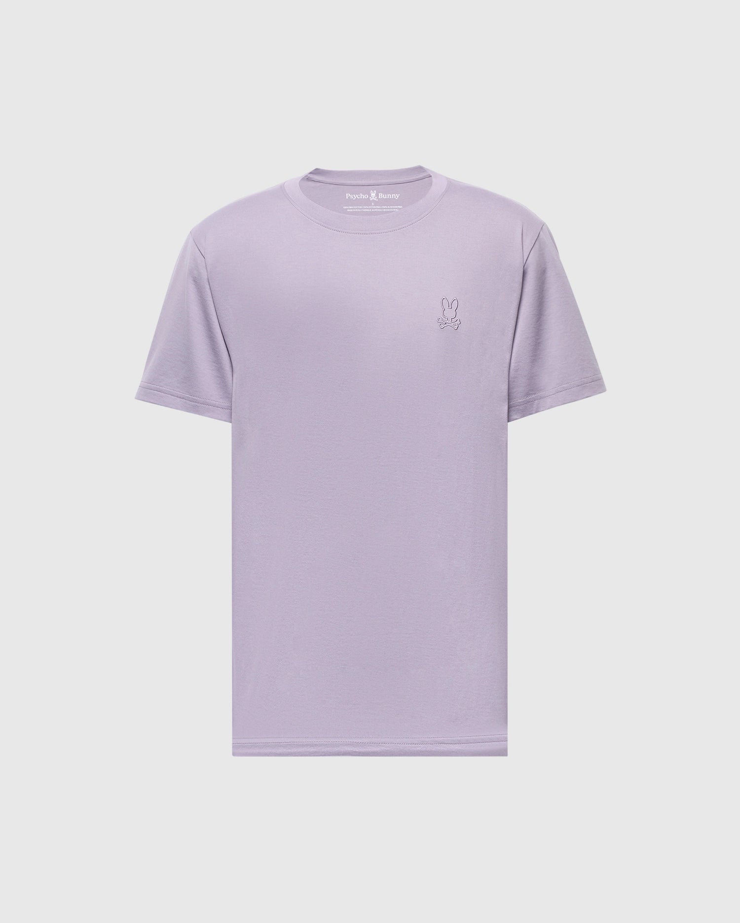 The Psycho Bunny MENS JAMES CREW NECK TEE in light purple is made from soft Pima cotton. It features a small embroidered rabbit logo on the left chest, a classic round neckline with a crease-resistant collar, and short sleeves on a plain white background.