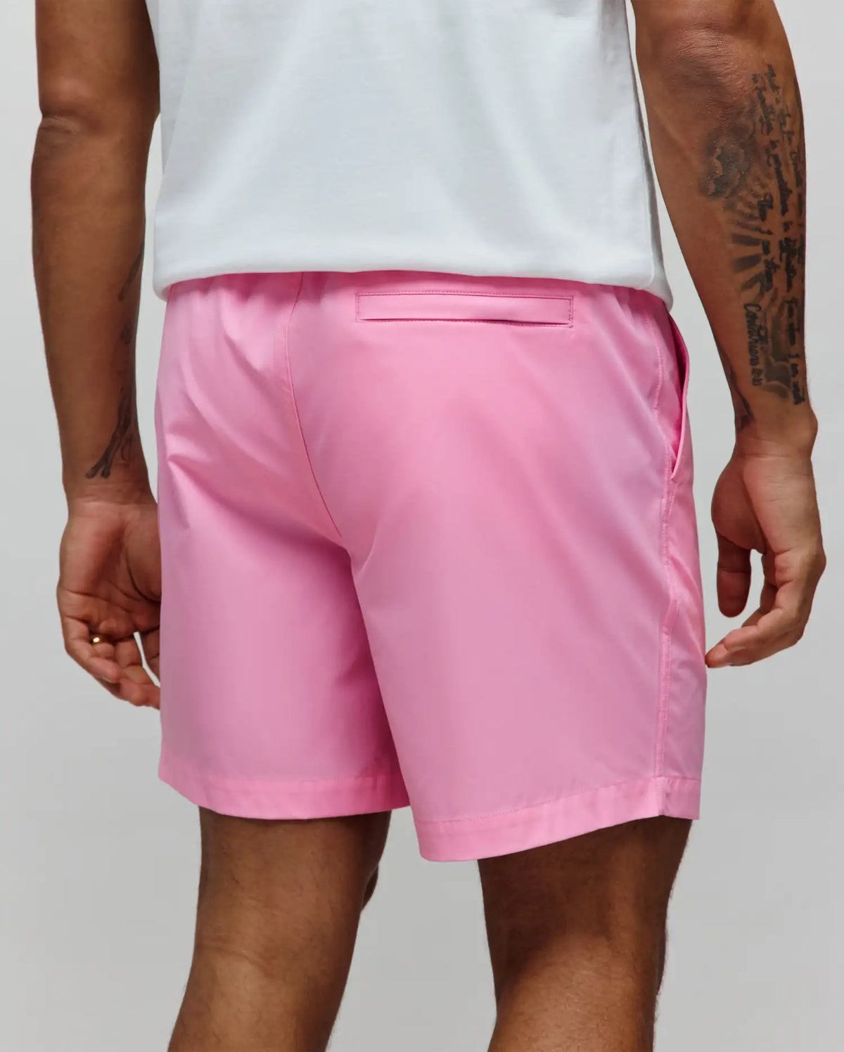 Mens Samos Hydrochromic Printed Swim Trunk in vibrant pink, featuring a smooth, quick-dry fabric, relaxed fit, side pockets, and a single back flap pocket. (5)