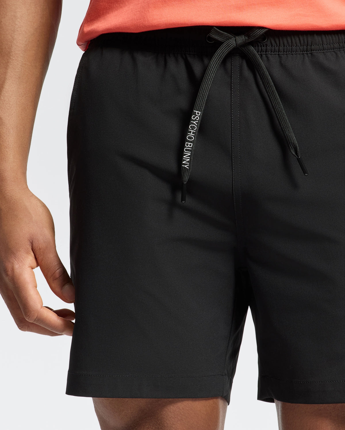 Black Mens Samos Hydrochromic Printed Swim Trunk, a classic fit, smooth quick-dry fabric, featuring an elasticated waist and a prominent black drawstring with white Psycho Bunny branding.