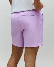 Mens Samos Hydrochromic Printed Swim Trunk in light lavender, featuring a relaxed fit, smooth quick-dry fabric, elastic waistband, side pockets, and a single back flap pocket.