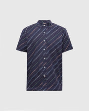 The Psycho Bunny Men's Big and Tall Renmark Stretch Poplin Woven Shirt offers a premium stretch poplin fabric with diagonal dark blue stripes, accented with teal and orange lines featuring white text on a light gray background. It includes a standard collar, seven buttons, and a stylish logo pattern.