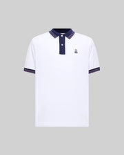 Mens Big And Tall Kenyon Lightweight Pique Polo in white, featuring a navy blue collar with red stripes, two-button placket, and ribbed cuffs with red stripes. Small embroidered Psycho Bunny logo on left chest.