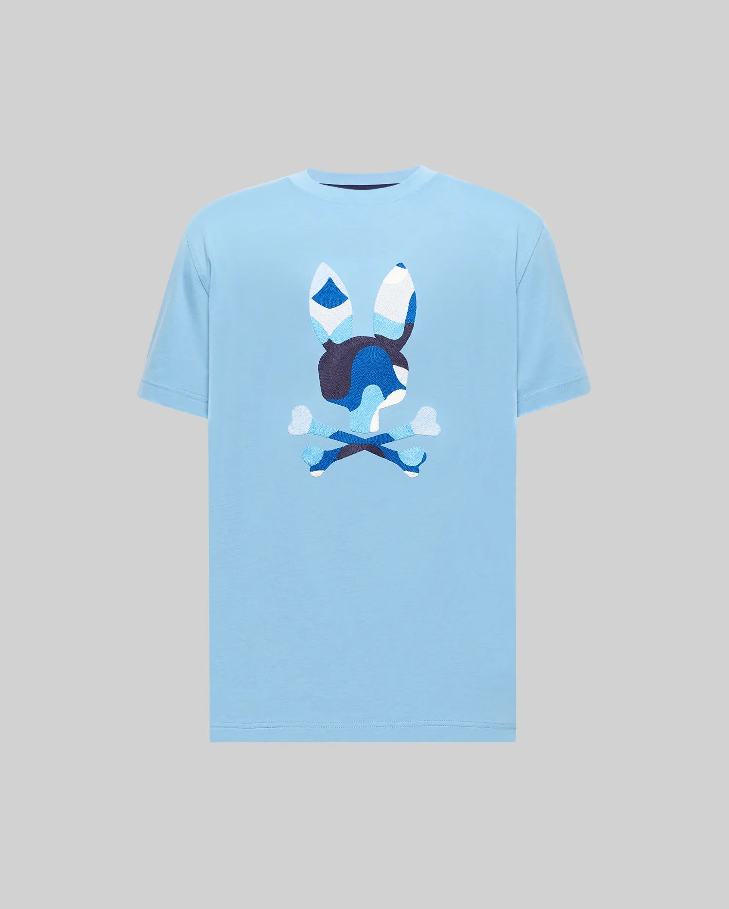 Mens Big And Tall Ara Graphic Tee, light blue jersey t-shirt with a large central Psycho Bunny skull logo featuring a blue and white camouflage pattern, classic fit.