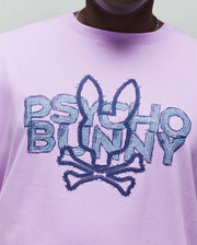 Mens Big And Tall Herman Graphic Tee, lavender jersey knit, relaxed fit, featuring a large central chest graphic with a dark blue embroidered bunny skull outline and teal scribble-fill text.