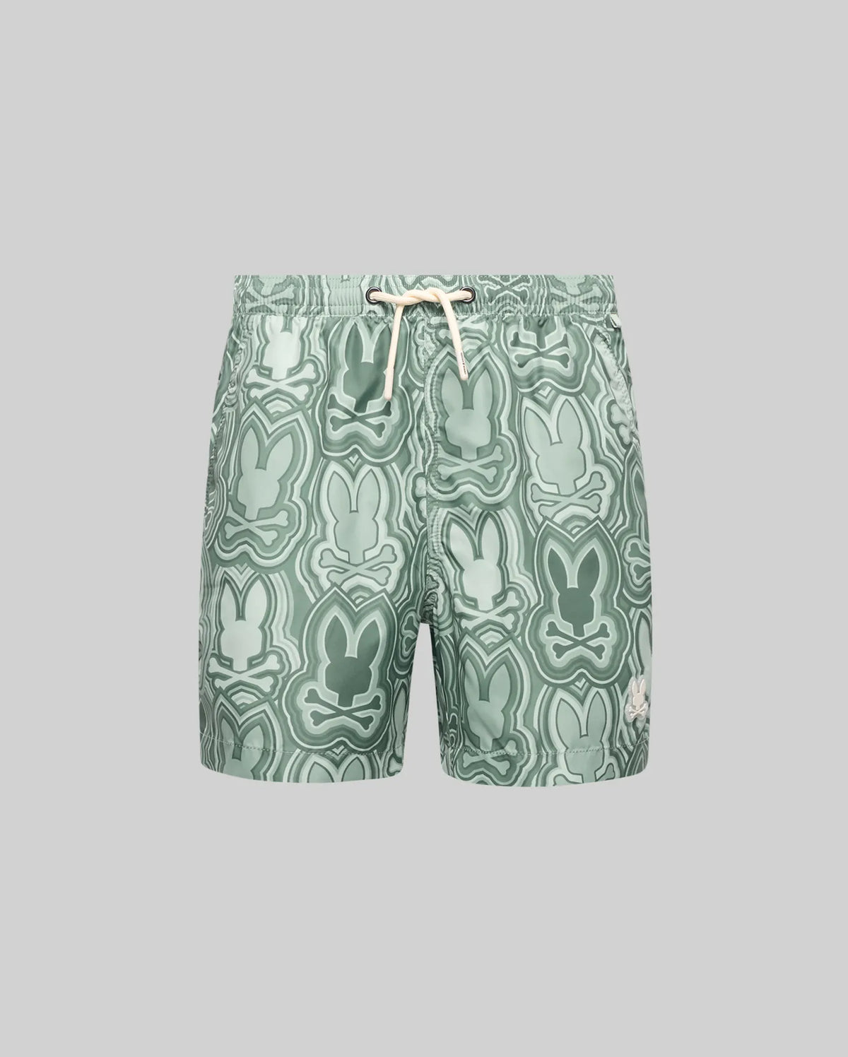 The Psycho Bunny KIDS CHUCK ALL OVER PRINT LIGHTWEIGHT SWIM TRUNK (KB1000002) features light green recycled polyester, a drawstring waist, and abstract bunny silhouettes in green shades, shown on a plain grey background.