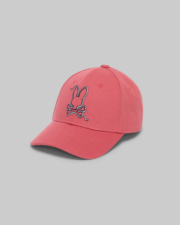 The KIDS CYRUS BASEBALL CAP - KO1500014 by Psycho Bunny features a pink design with an embroidered bunny head and crossed bones logo on the front, shown against a light gray background for a subtle nautical touch.