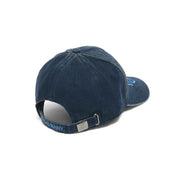 KIDS' GROVER BASEBALL CAP in navy washed denim with light blue embroidered Psycho Bunny skull logo on front, Psycho Bunny text on back strap, and engraved logo buckle. (4)