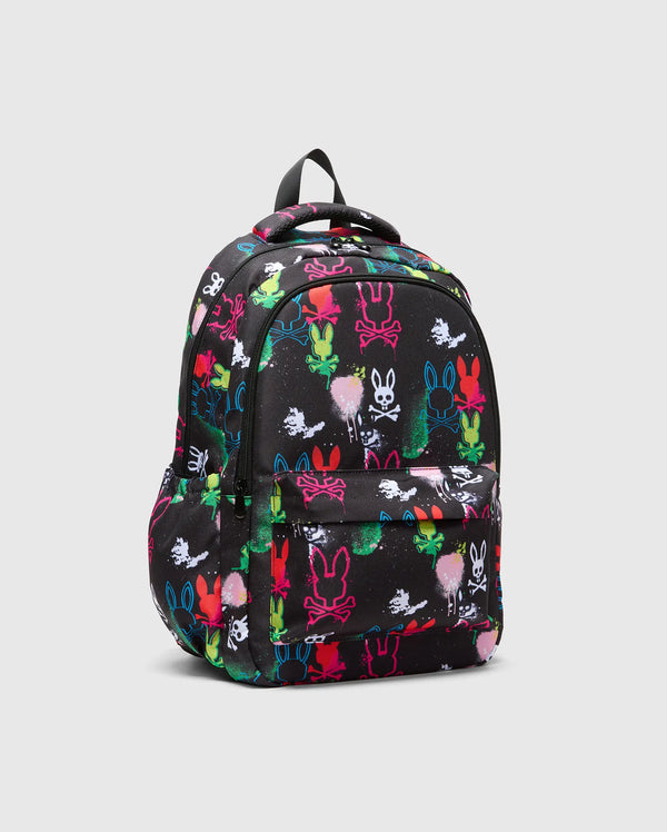 Kids Quintin Backpack, black durable fabric with a bold, all-over neon graffiti print featuring various Psycho Bunny skull and bunny outline logos, plus colorful paint splatters.