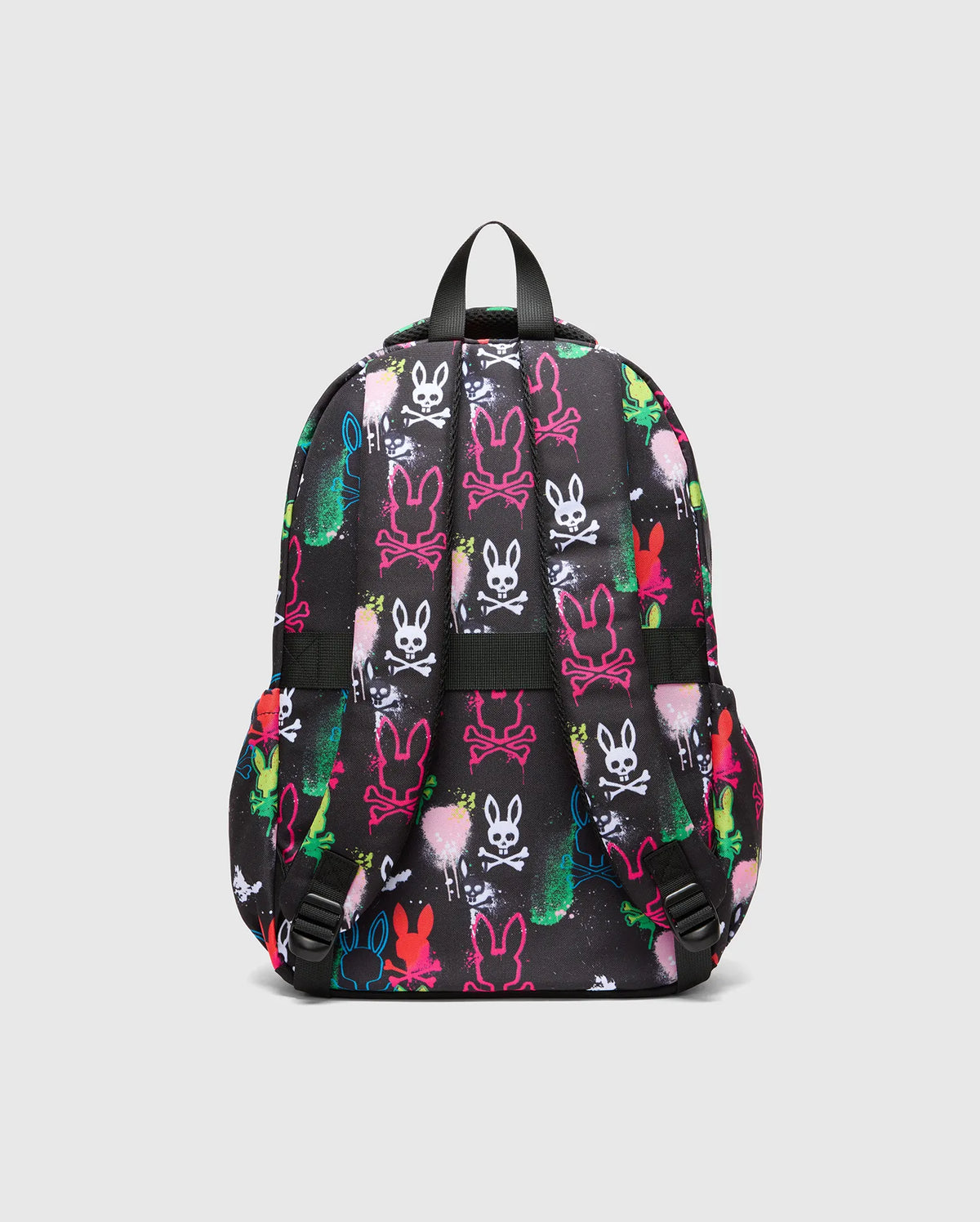 Kids Quintin Backpack, black with an all-over neon graffiti print featuring Psycho Bunny skull logos and outline bunny heads in vibrant pink, green, blue, yellow, white, and red, accented with spray paint splatters. (4)