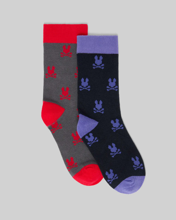 The Psycho Bunny KIDS 2 PACK DRESS SOCK (KO2200003) features two pairs: gray socks with red bunny skulls and navy socks with purple accents, both crafted from soft Pima cotton—perfect for adding playful flair to any formal outfit.