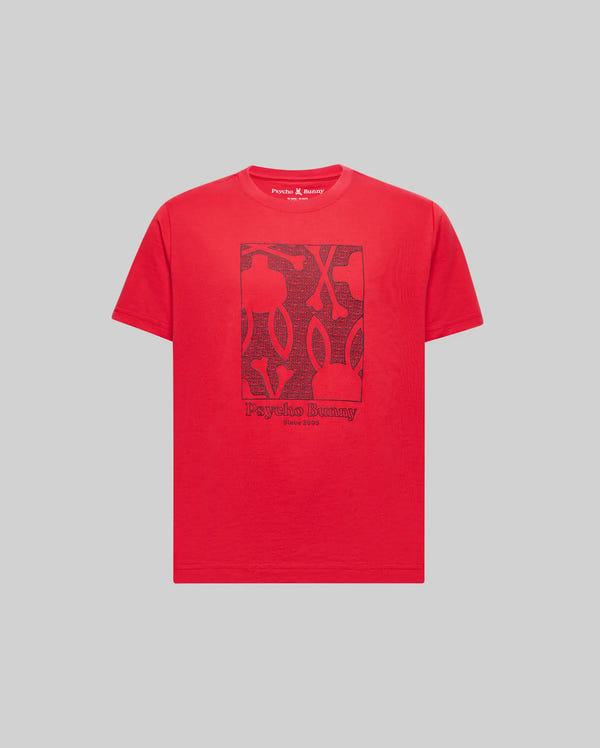 The KIDS GLENN GRAPHIC TEE (KT0200020) by Psycho Bunny is a bright red Pima Cotton short-sleeve t-shirt with a black abstract graphic, "Psycho Bunny" logo, and "Since 2005" on the chest, shown on a plain light gray background.