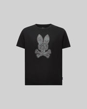 The Psycho Bunny KIDS ROWEN BUNNY GRAPHIC TEE (KT0200058) features a large bunny head above crossed bones on the front. Made from soft Pima cotton in Peru, this black short-sleeve tee has a plain light gray background.