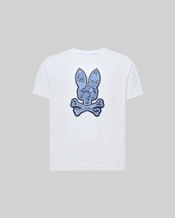 The Psycho Bunny KIDS ROWEN BUNNY GRAPHIC TEE (KT0200058) is a white Pima cotton tee featuring a blue bunny head over crossed bones, giving a playful skull-and-crossbones look against a plain gray background.
