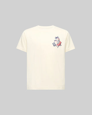 The Psycho Bunny KIDS SONNY GRAPHIC TEE (KT0200091) is a regular fit, off-white short-sleeve t-shirt featuring a small embroidered person relaxing in a red hammock between two palm trees with sandals nearby on the left chest.