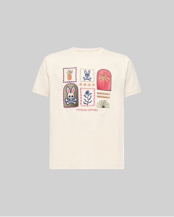The KIDS SUNDEW GRAPHIC TEE (KT0200092) by Psycho Bunny is a beige Pima cotton shirt with six colorful graphic patches—bunny, flowers, and plants—on the chest and "Psycho Bunny" text beneath. Light gray background shown.