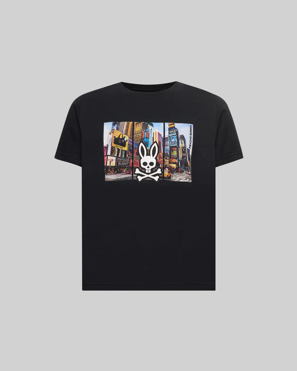 Kids Zeke Graphic Tee, a classic fit black jersey t-shirt featuring a vibrant Times Square graphic print on the chest, overlaid with a large white Psycho Bunny skull logo and vertical Psycho Bunny text.