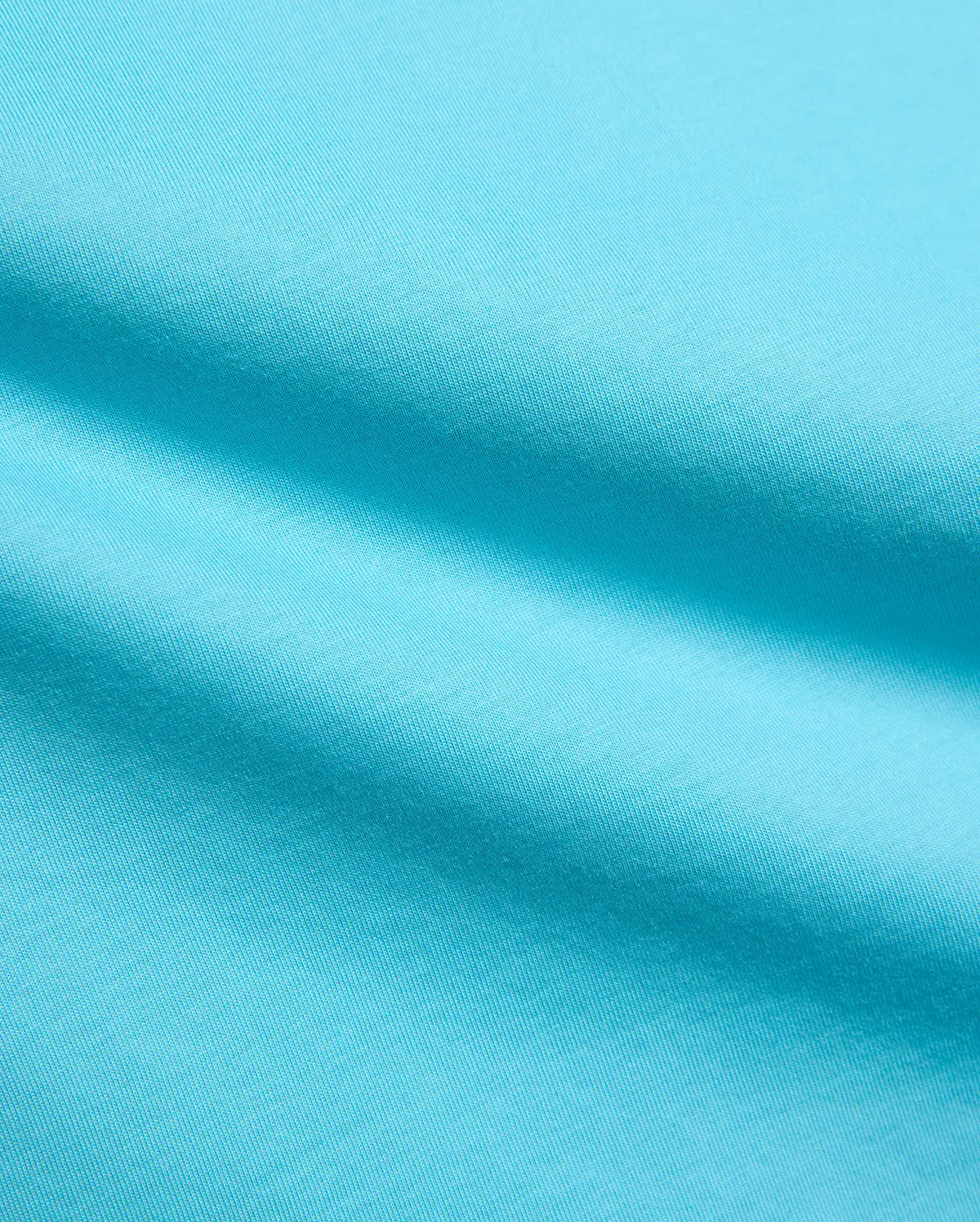 Kids Isaac Relaxed Fit Tee in vibrant aqua blue, crafted from soft jersey knit fabric, featuring the iconic small embroidered Psycho Bunny skull logo on the chest. (6)