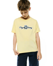 Kids Jaydon Wordmark Graphic Tee in light yellow soft jersey, classic fit, featuring a prominent blue and white Psycho Bunny wordmark graphic with the iconic bunny skull logo on the center chest. (2)