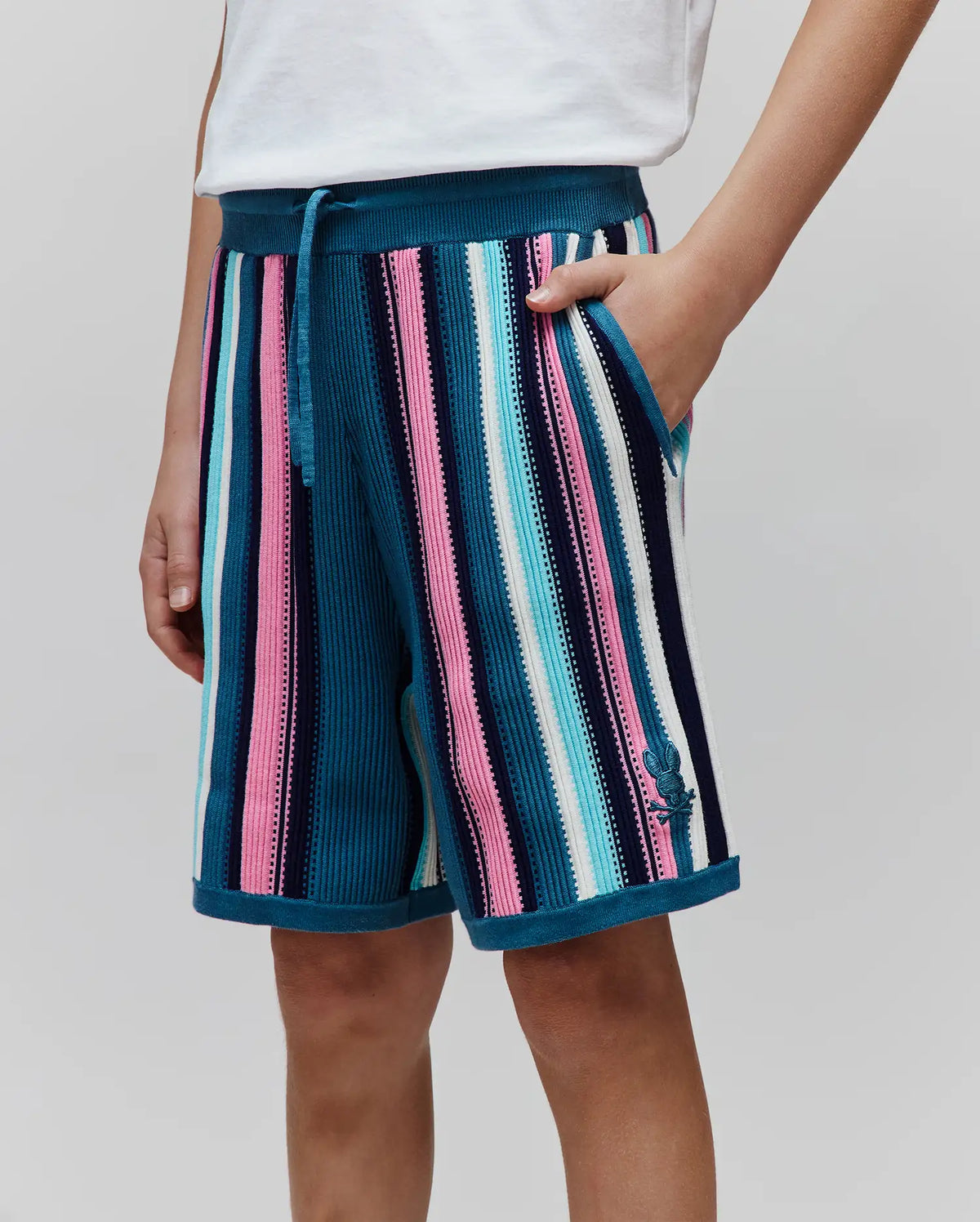 Teal, Pink, Light Blue, White, Navy striped Kids Cliff Knit Short with ribbed texture, drawstring waist, and small embroidered Psycho Bunny skull logo on the lower left leg. (2)
