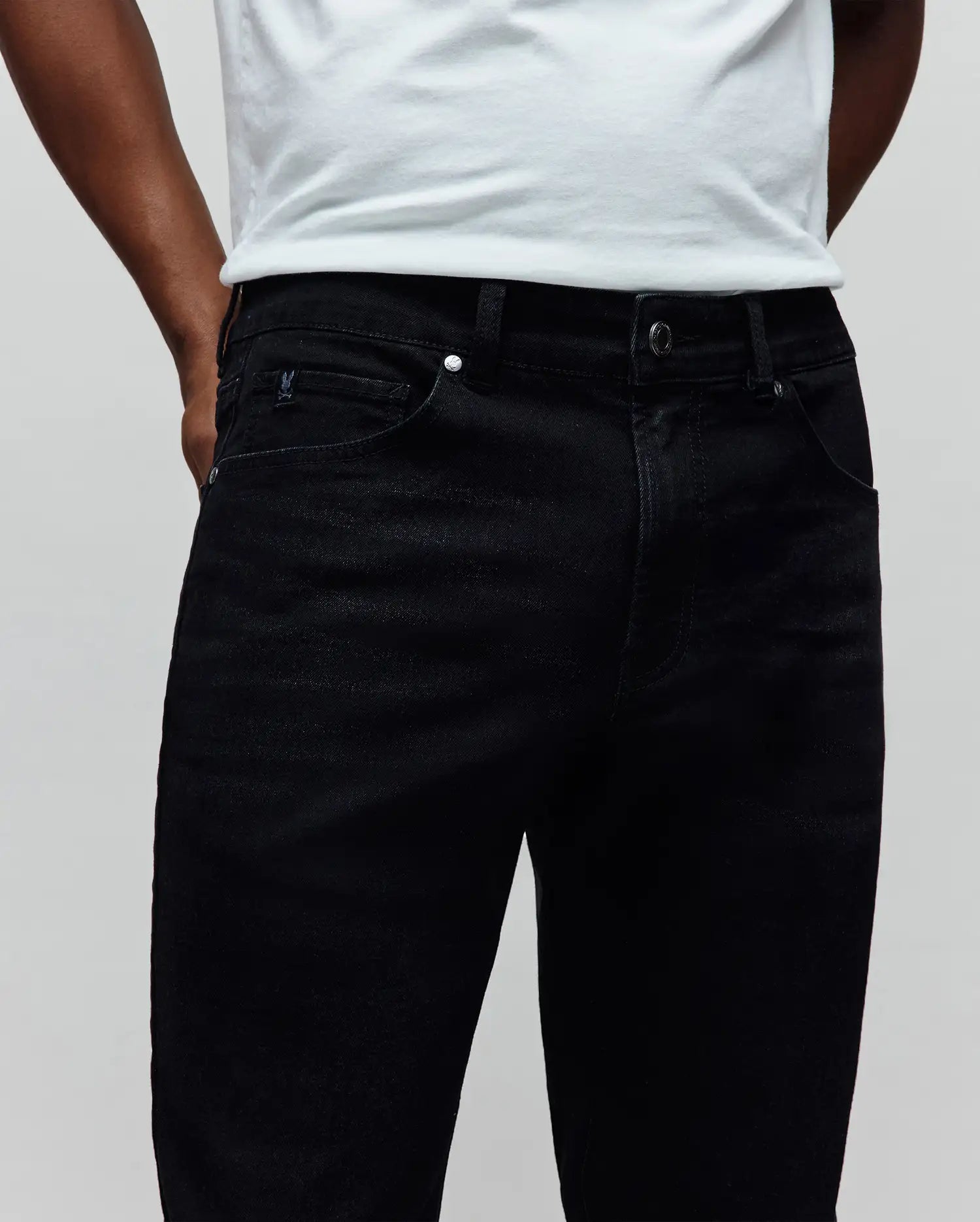 Mens Emerson Denim Pant, classic fit dark wash black denim jeans with silver hardware and a small embroidered Psycho Bunny logo on the right coin pocket.