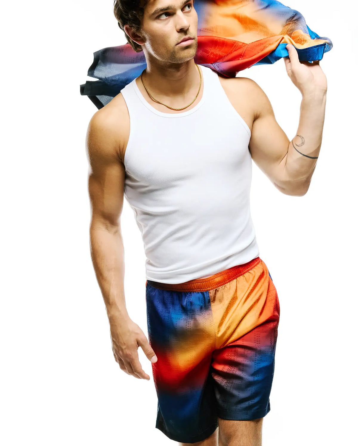 Mens Zander Jacquard Short featuring a vibrant orange, red, and blue gradient with a subtle geometric jacquard pattern, offering a relaxed fit in a smooth fabric, embodying Psycho Bunny's bold streetwear aesthetic. (4)