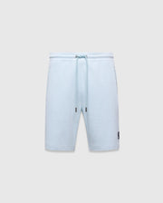 Mens Keith Short 8 light blue pique knit shorts, relaxed fit, featuring a drawstring waist with silver eyelets and dark blue tips, and a small embroidered dark blue Psycho Bunny skull logo on the lower left leg. (5)