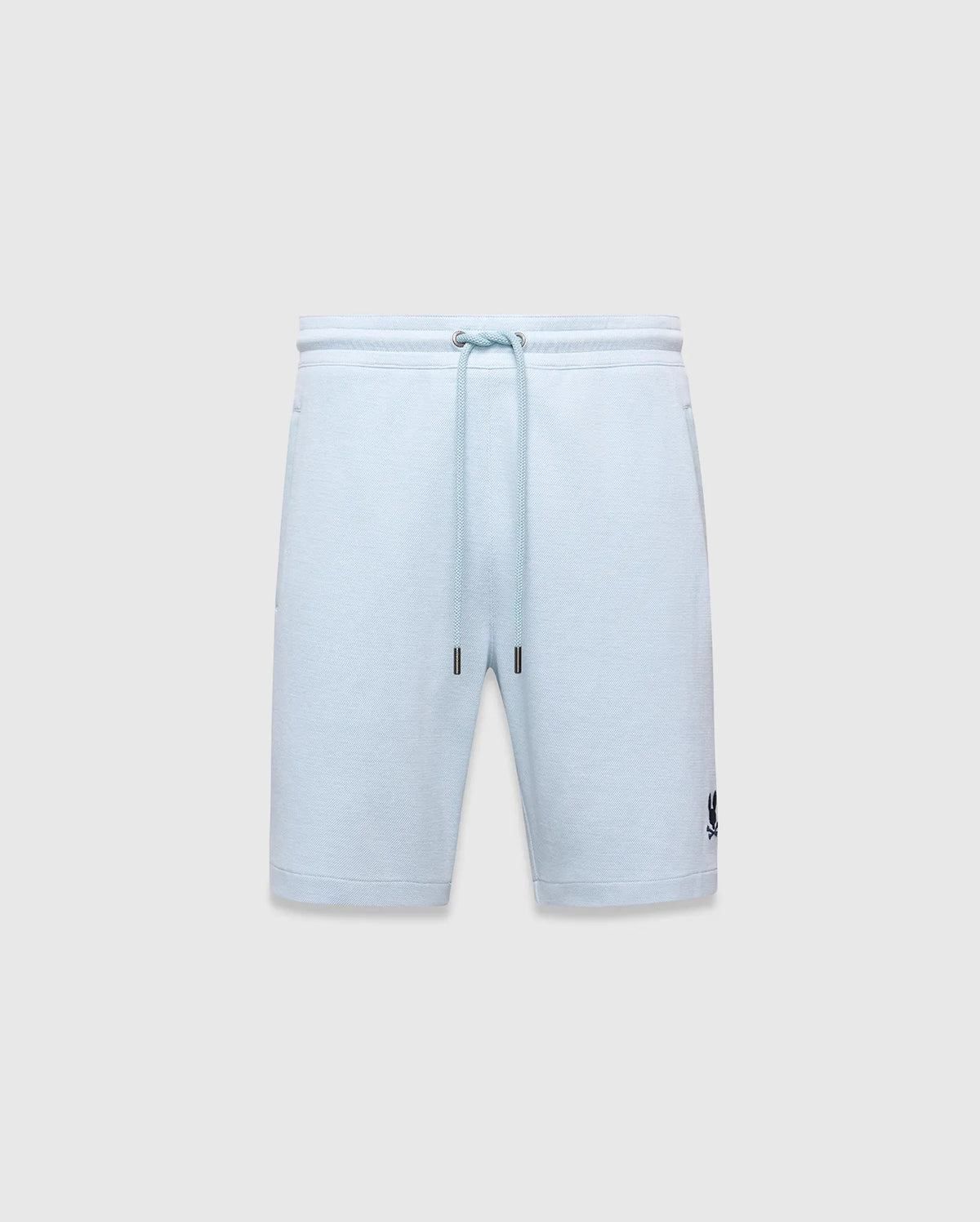 Mens Keith Short 8 light blue pique knit shorts, relaxed fit, featuring a drawstring waist with silver eyelets and dark blue tips, and a small embroidered dark blue Psycho Bunny skull logo on the lower left leg. (5)