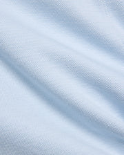 Mens Keith Short 8, showcasing a close-up of its premium light blue pique knit fabric, featuring a subtle, breathable texture, embodying Psycho Bunny's refined streetwear aesthetic. (6)