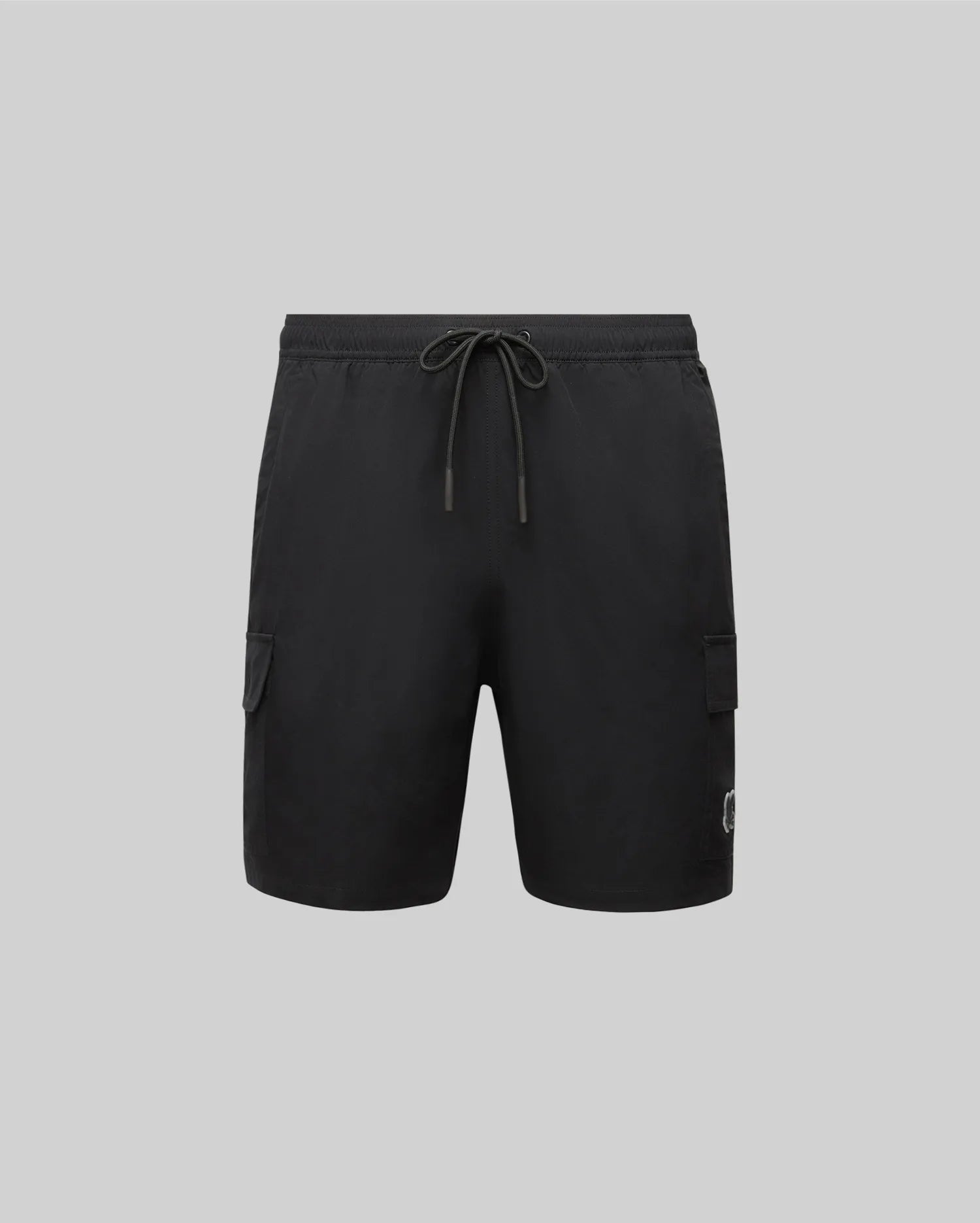 The Psycho Bunny MENS RANDY BOARD SHORT - MB1000002 features an elastic waistband, drawstring, and two side cargo pockets—ideal for casual beachwear. Shown on a plain light gray background.