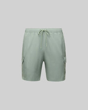 The Psycho Bunny MENS RANDY BOARD SWIM SHORT (MB1000002) features light green polyester, an elastic waistband with drawstring, and spacious cargo pockets—ideal for casual beachwear. Shown on a plain light gray background.