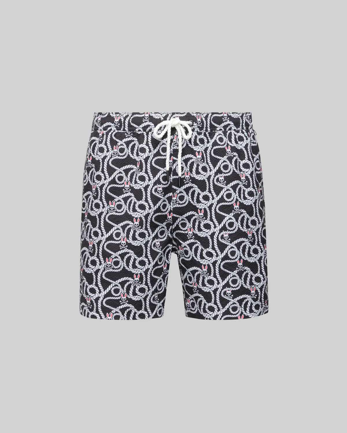 The MENS CYRUS ALL OVER PRINT SWIM TRUNK (MB1000004) by Psycho Bunny features a white and red snake pattern on black quick-dry seersucker, with a white drawstring waist, shown against a plain gray background.