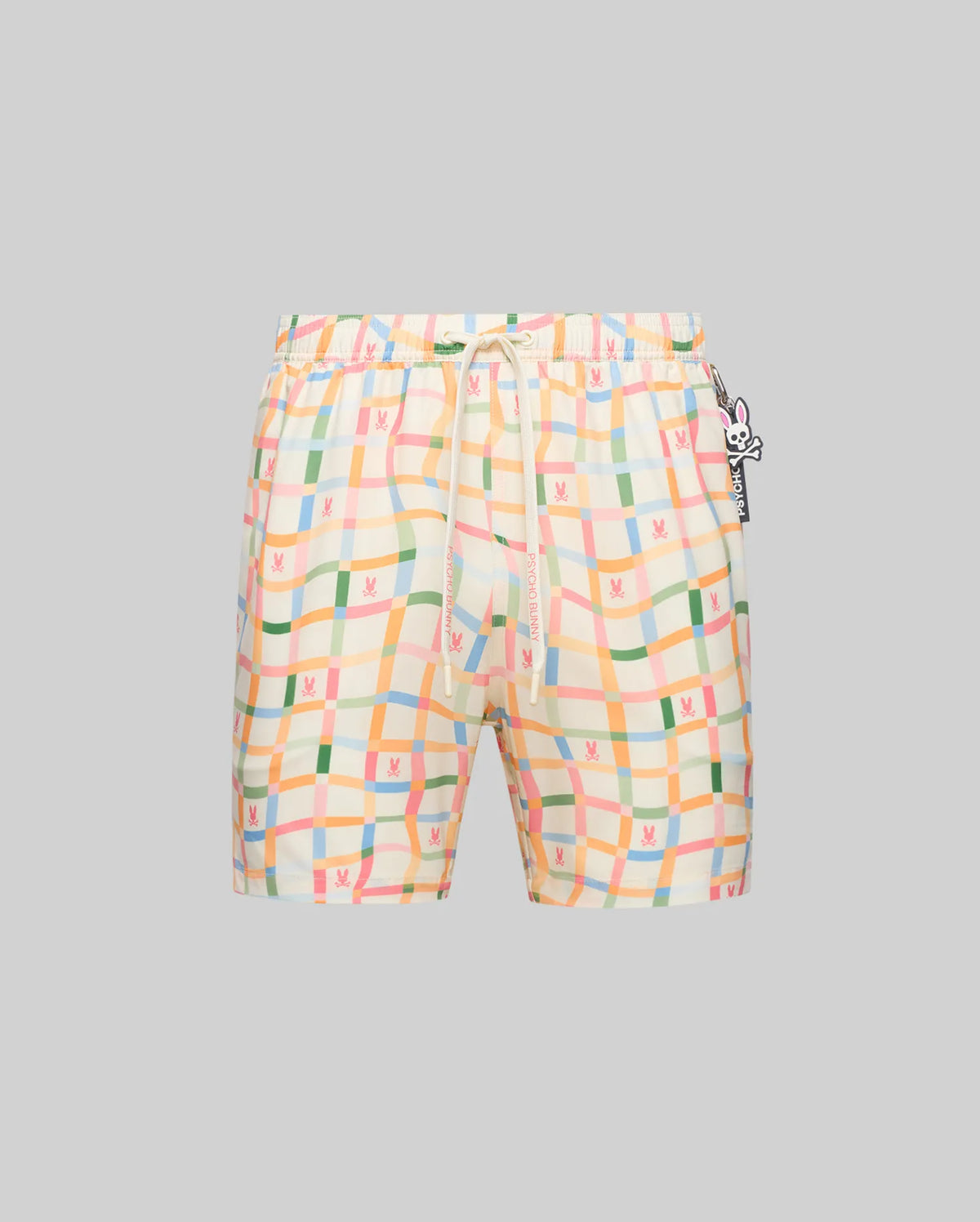 Mens Atlas Swim Trunk, cream with a multicolor wavy plaid pattern, featuring small repeated Psycho Bunny skull logos, a branded drawstring, and a side logo charm.