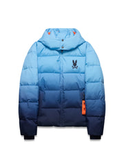 Men's Solan Puffer Jacket, an ombre light blue to navy quilted design with a hooded collar, small embroidered black Psycho Bunny skull logo on the left chest, and an orange branded tag. (7)