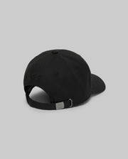 The Psycho Bunny MENS CYRUS BASEBALL CAP - MO1500045 is shown from the back on a gray background, highlighting its adjustable strap with metal buckle and subtle side embroidery for a hint of coastal charm.