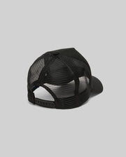 The Psycho Bunny MENS AUGUSTE TRUCKER CAP (MO1500050) is shown from the back, highlighting its black mesh design and adjustable snapback closure against a plain gray background.