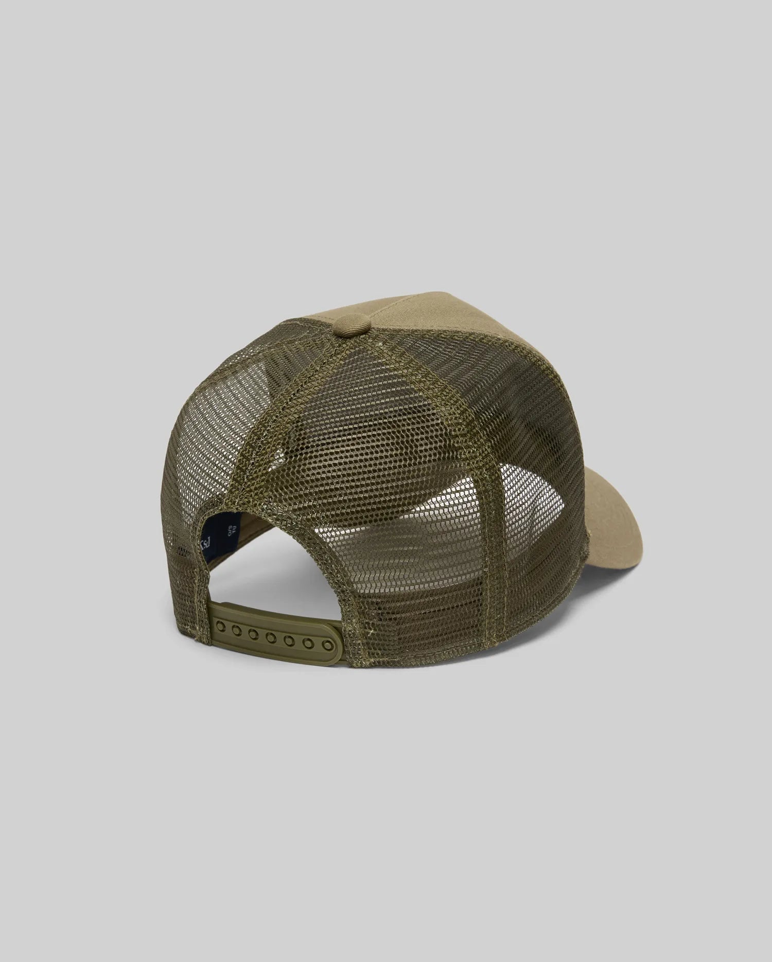 The Psycho Bunny MENS AUGUSTE TRUCKER CAP (MO1500050) features an olive green color, mesh back panels, chenille patch on the front and bill, and adjustable snapback closure, shown against a plain gray background.