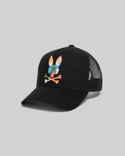 Mens Ara Trucker Cap, black with mesh back, featuring a large, vibrant multi-color embroidered Psycho Bunny skull logo on the front.