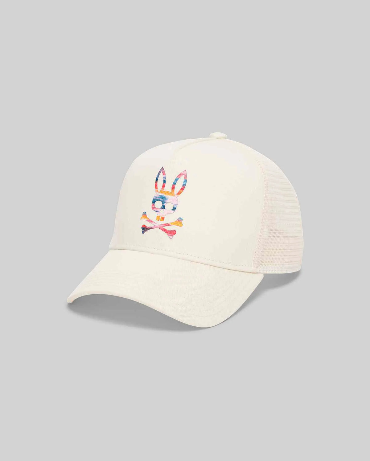Mens Raphael Trucker Cap, cream cotton twill front with mesh back, featuring a large, centered, multi-color Psycho Bunny skull logo in blue, pink, orange, and yellow.