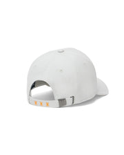 Mens Alex A-Frame Trucker Cap in white twill, featuring a silver buckle with an engraved bunny skull logo and three small orange embroidered bunny skull logos on the adjustable back strap. (4)