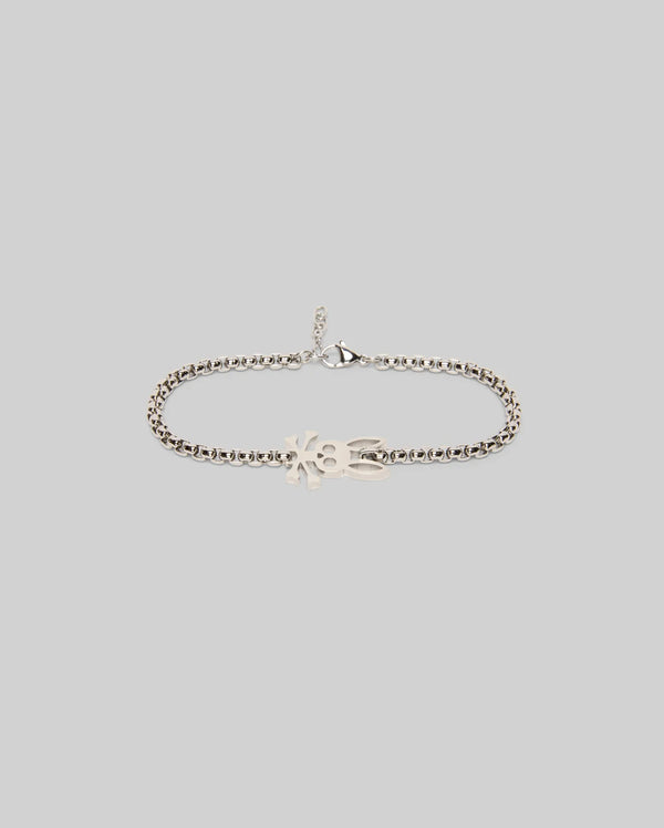 The Psycho Bunny MENS BUNNY BRACELET - MO1700018 is a silver steel piece with a lobster clasp and hand-shaped charm, showcased on a light gray background for classic appeal.