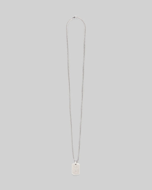 The Psycho Bunny MENS ARMY TAG NECKLACE - MO1700021 features a silver rectangular dog tag pendant on a steel cable chain, shown against a plain light gray background.