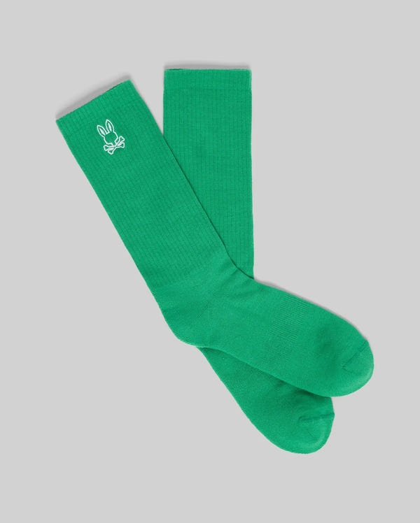 The Psycho Bunny MENS NEW CLASSIC SPORT SOCK (MO2200001) is a pair of bright green knee-high socks featuring a small white cartoon bunny head near the top, displayed flat on a light gray background.